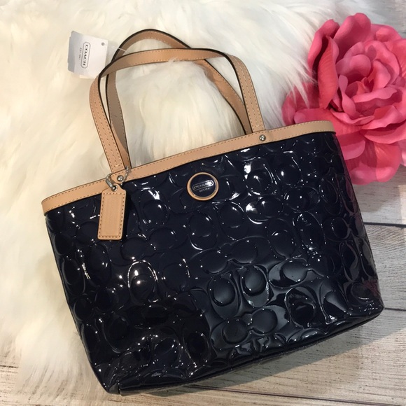 Coach Handbags - NWT Navy & Tan Coach signature leather trim bag